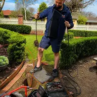 Plumber at a drainage excavation, Mordialloc